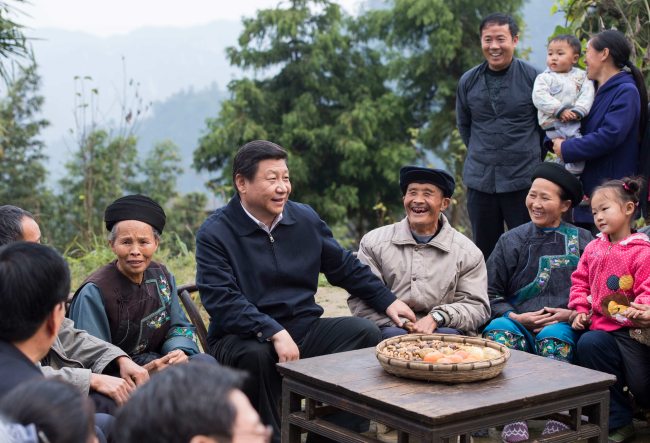 3. listopadu 2013 vedl čínský prezident Xi Jinping rozhovor s kádry a občany vesnice Shibadong (Š'-pa-tung) v okresu Huayuan (Chua-jüan) v autonomním kraji etnických skupin Tujia (Tchu-ťia) a Miao (Miao)na západě provincie Hunan (Chu-nan).