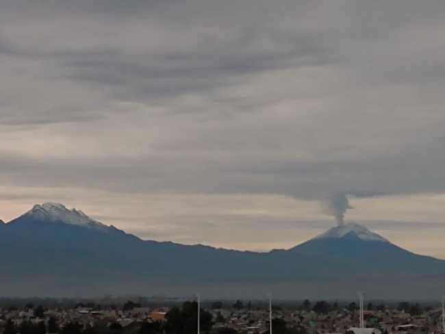 Grafika reprezentado 1 Bildo de la vulkanoj situantaj en la ĉefurbo de Meksika Respubliko, ĝentile pri Chiquete Rodríguez.