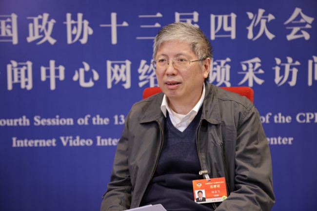 Yang Mengfei, membro de la Nacia Komitato de la Ĉina Popola Politika Konsultiĝa Konferenco, ĝenerala komandanto kaj ĝenerala planisto de sistemo de sondilo “Chang’e – 5” kaj akademiano de Ĉina Akademio de Sciencoj