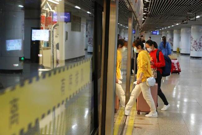 Fotas Zhu Xingxin el China Daily